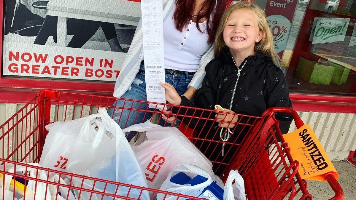 Operation Bags Packed organizer Lauren Silva and Madison Marvel of Taunton shop at Staples for school supplies from donations.   Submitted photo