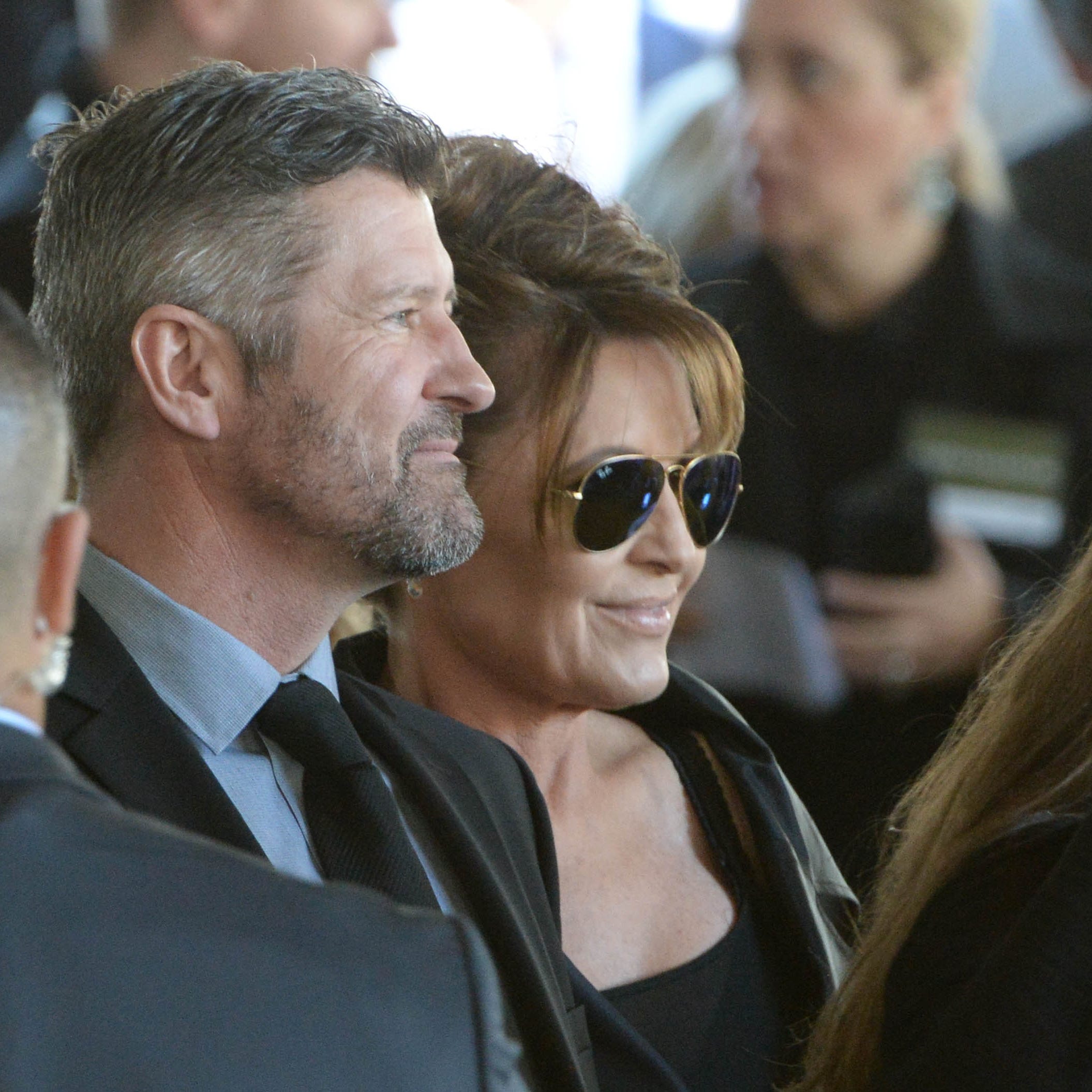 Sarah Palin and her husband Todd Palin arrive before the private funeral service for Billy Graham in a tent outside the Billy Graham Library in Charlotte, N.C. on Friday, March 2, 2018.