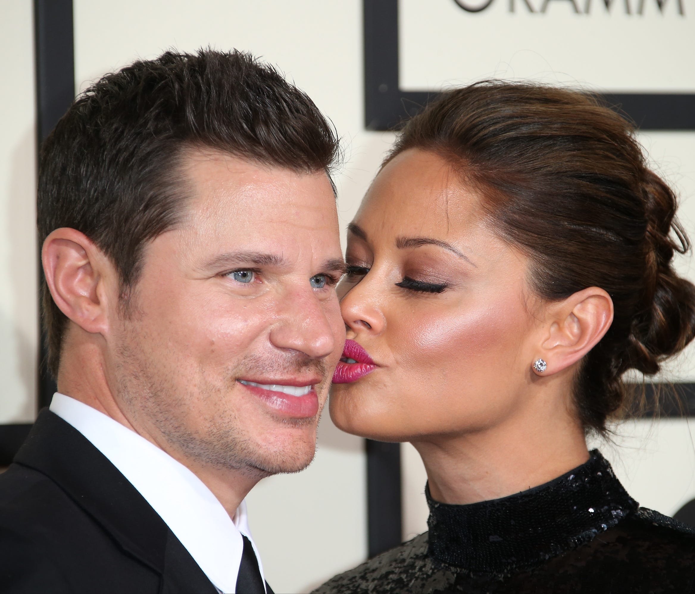 Will spouses Nick Lachey, left, and Vanessa Lachey be this lovey-dovey when they compete against each other on ABC's 'Dancing With the Stars?'