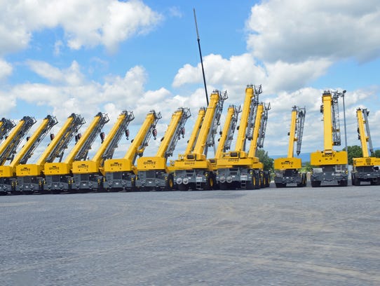 Cranes that are destined for customers are on display