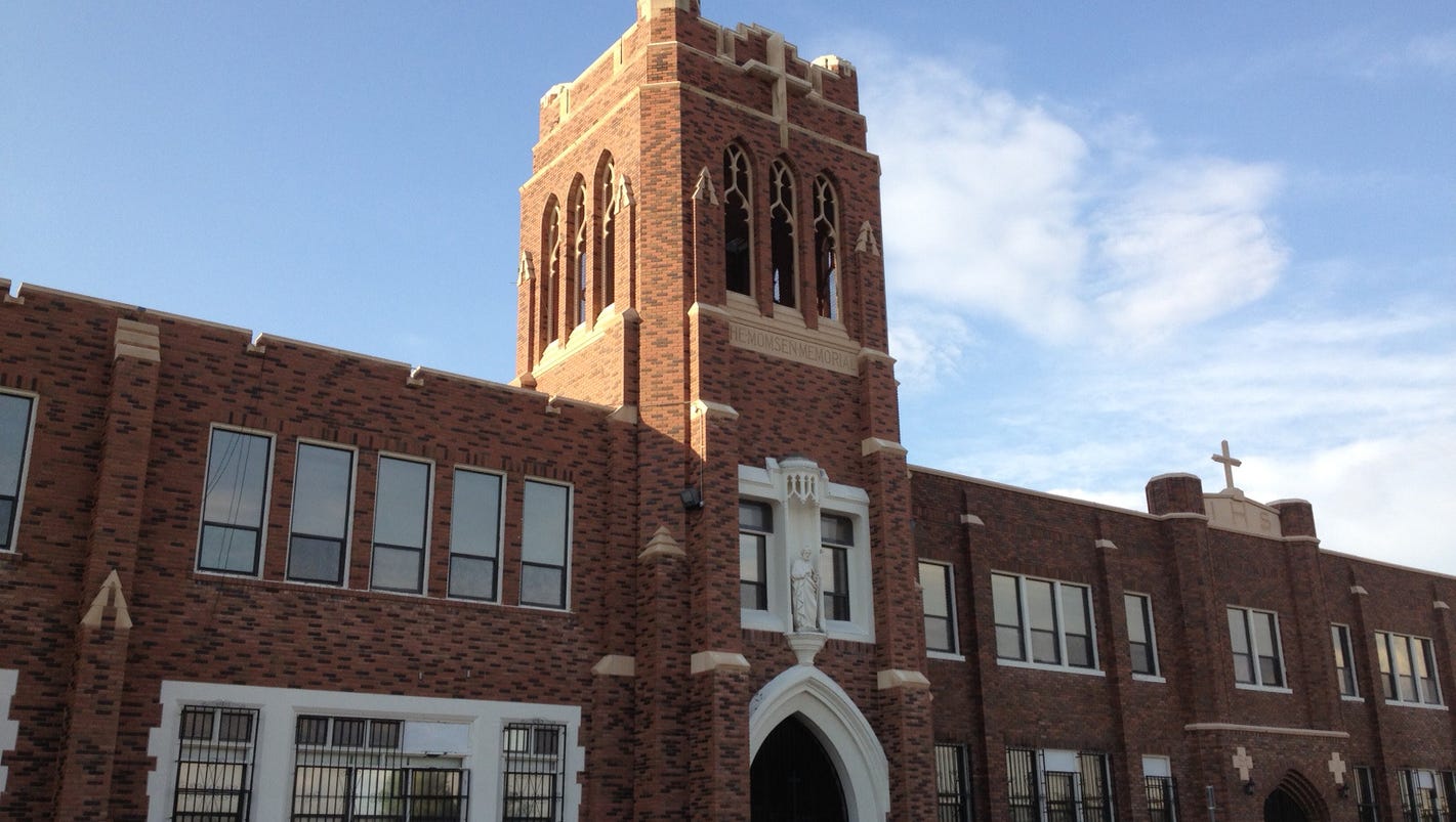 Audit: 2 men took $800,246 from Catholic school