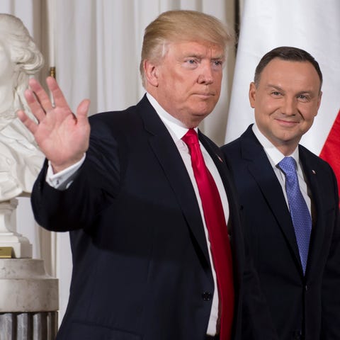 Polish President Andrzej Duda greets President Tru