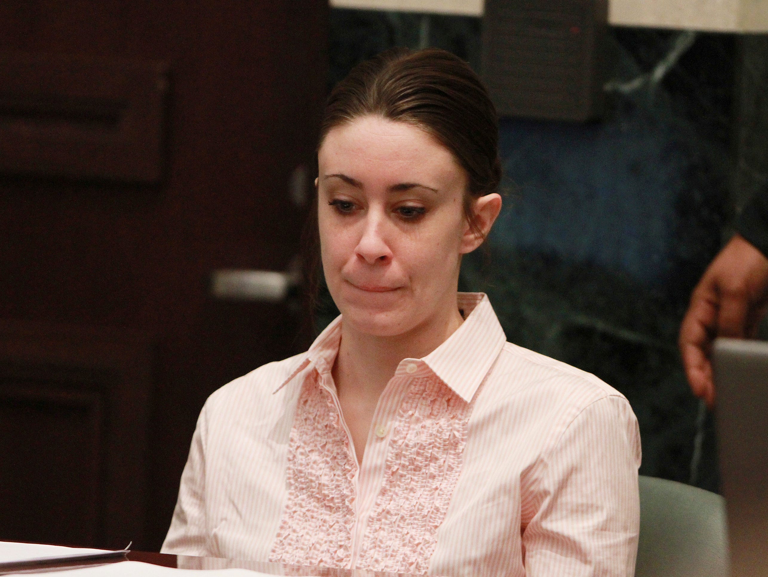 In this July 5, 2011 file photo, Casey Anthony sits at the defense table during the second day of jury deliberations in her murder trial in Orlando, Fla.