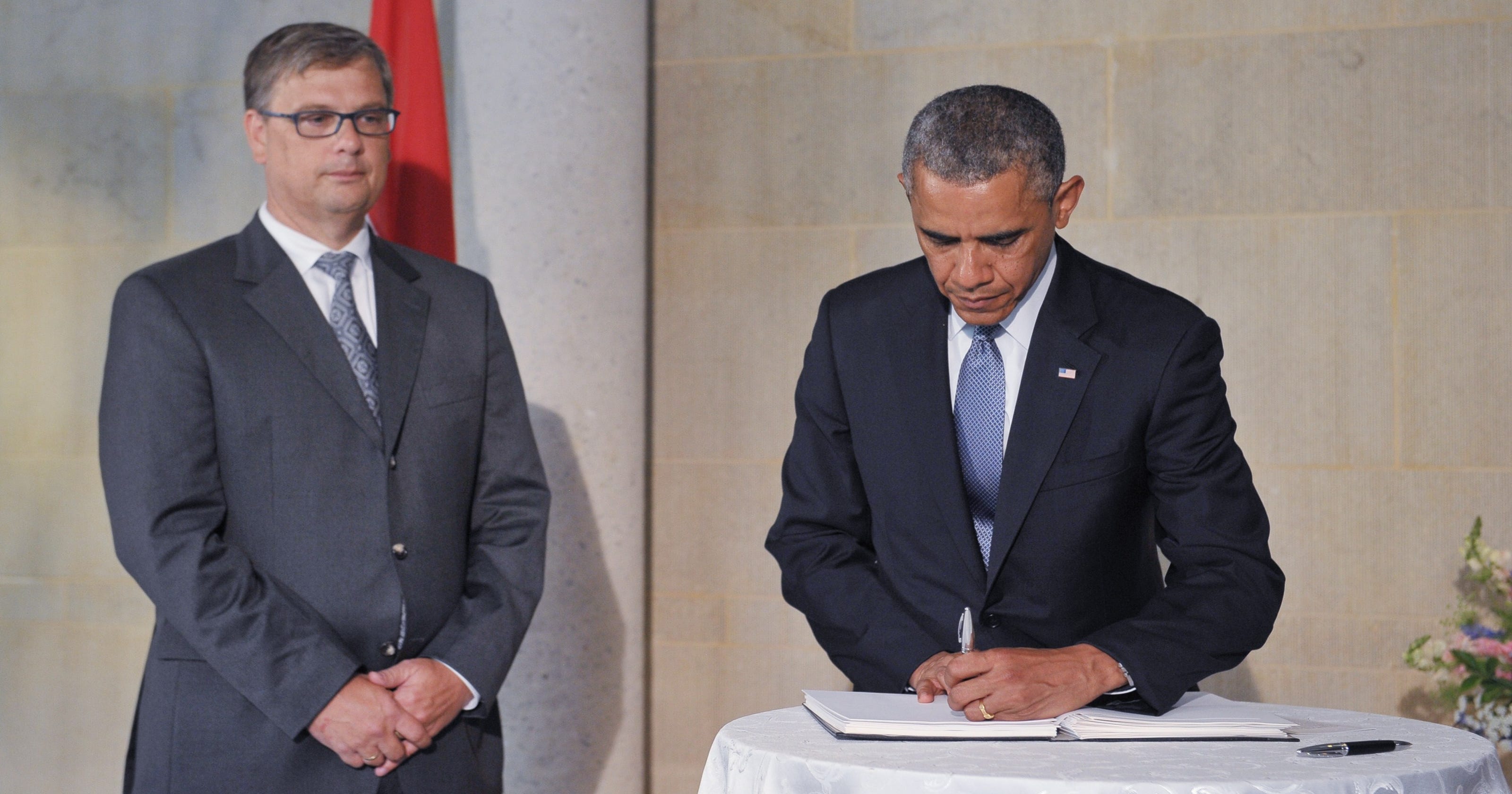 Obama Signs Condolence Book At Dutch Embassy 