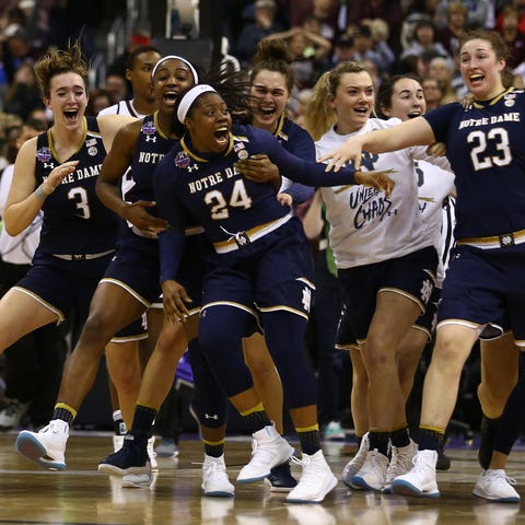 Notre Dame's Arike Ogunbowale celebrates with...