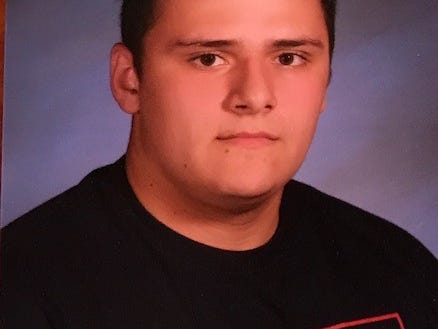 Wall Township High School junior Grant Berardo's T-shirt was digitally altered in the school's yearbook.