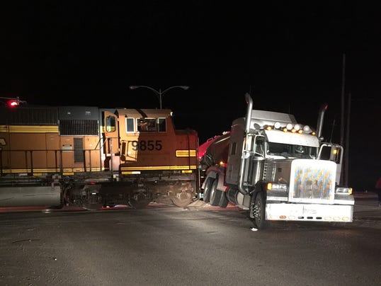 BNSF engine collides with semi at Greene St.