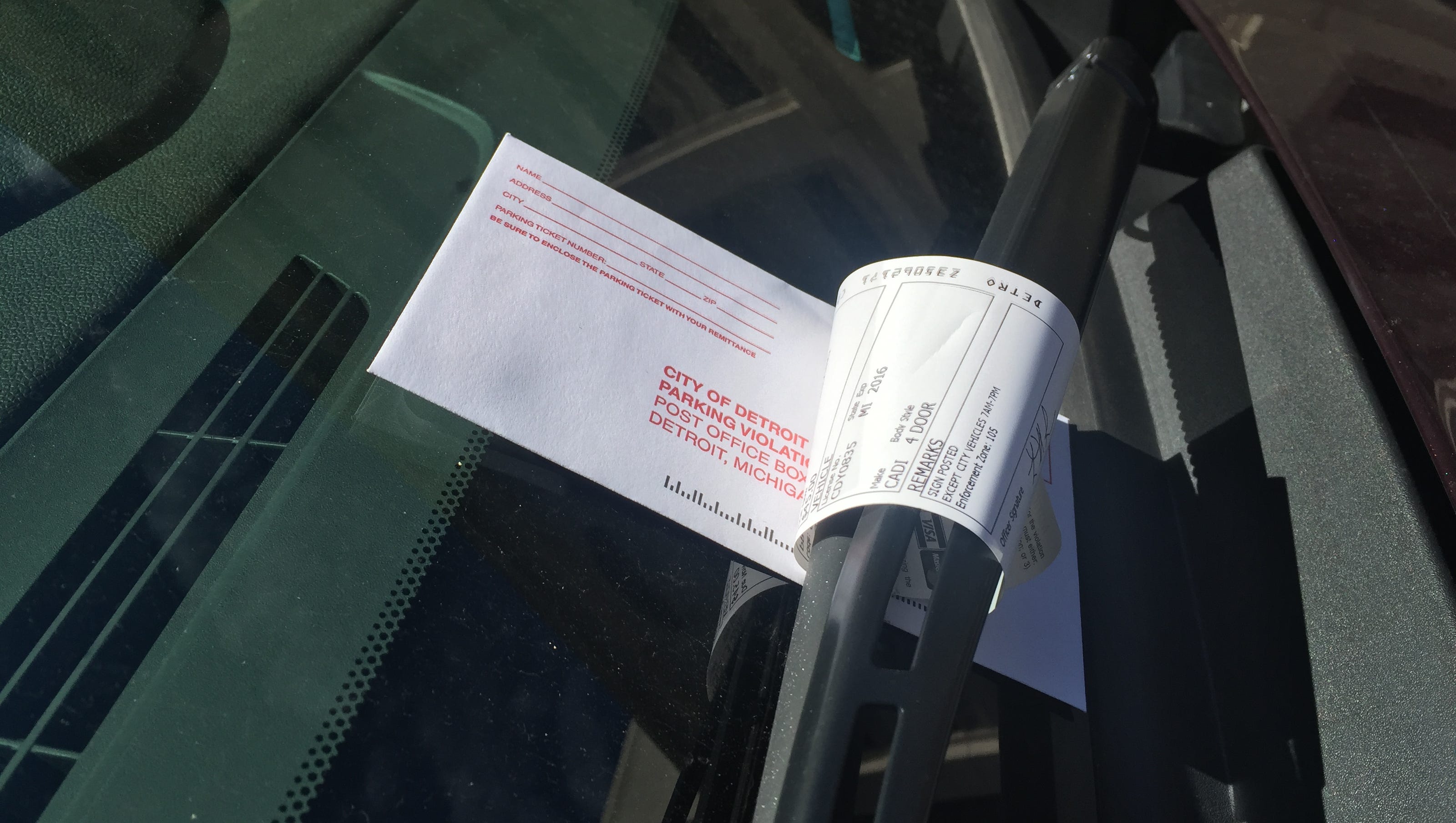 Detroit reinstates parking ticket discount for residents