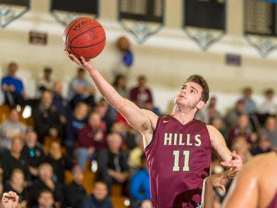 Joe Cerone of Wayne Hills extends to the basket during