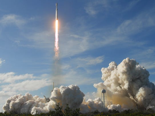 Falcon Heavy lifts off from Kennedy Space Center.