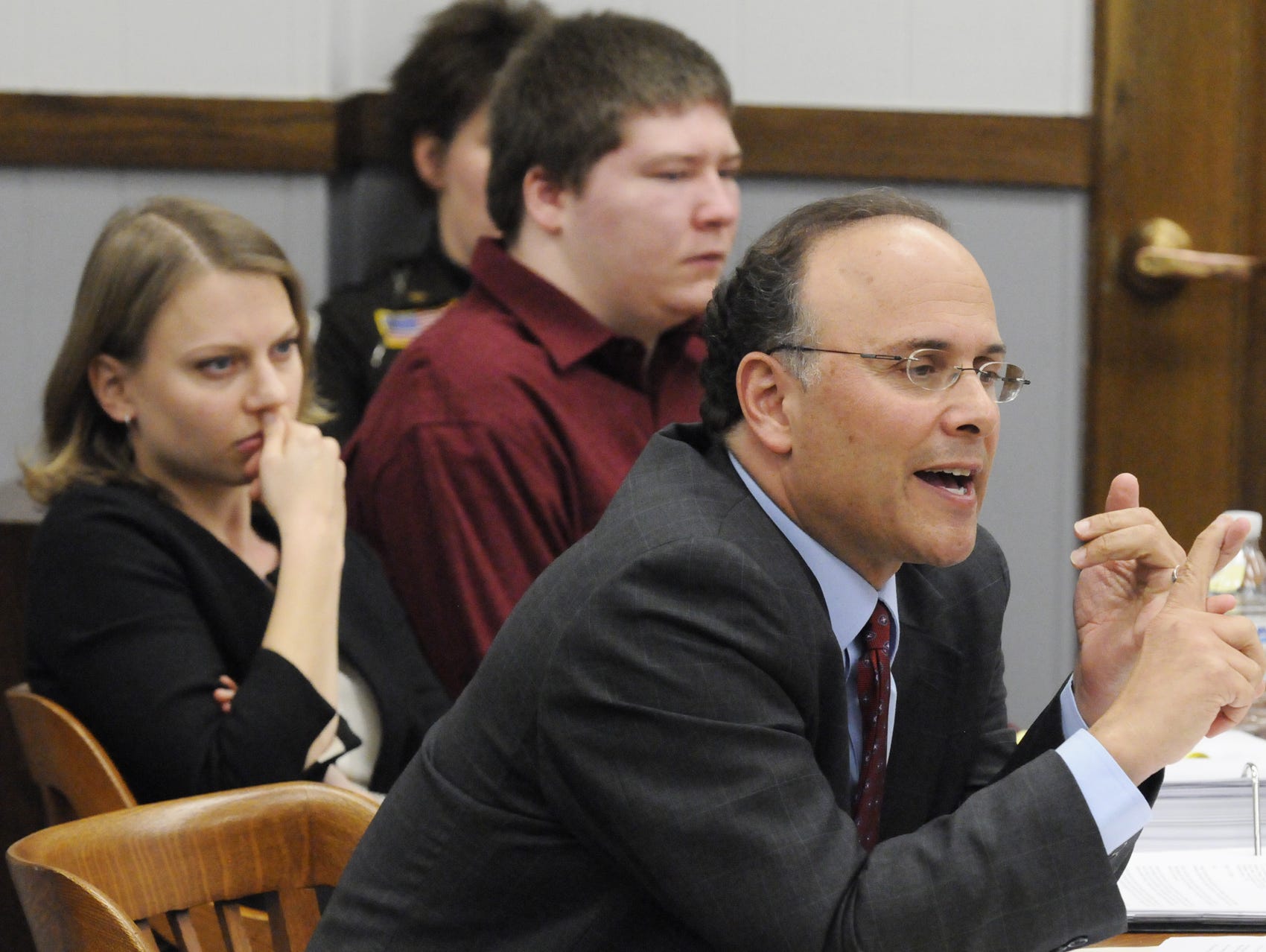 Brendan Dassey (center) and his defense team, Steven Drizin (right) and Laura Nirider, attend a post-conviction hearing in Manitowoc County in 2010.