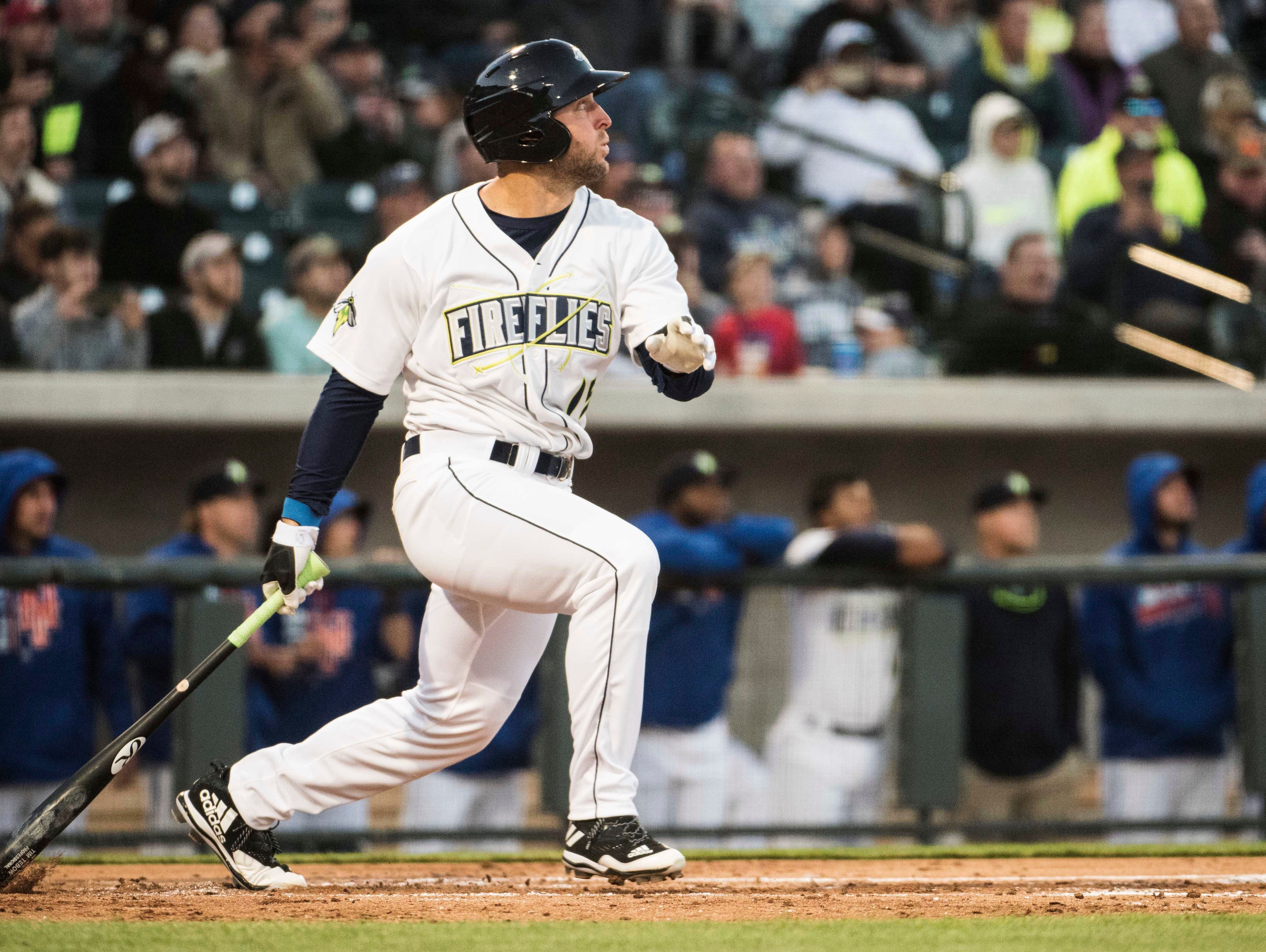 Tim Tebow watches his home run in his first at bat in the minors.