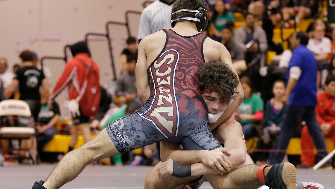 Wrestlers battle to make state at tournament