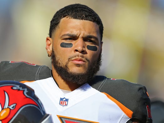 Tampa Bay Buccaneers wide receiver Mike Evans sat during