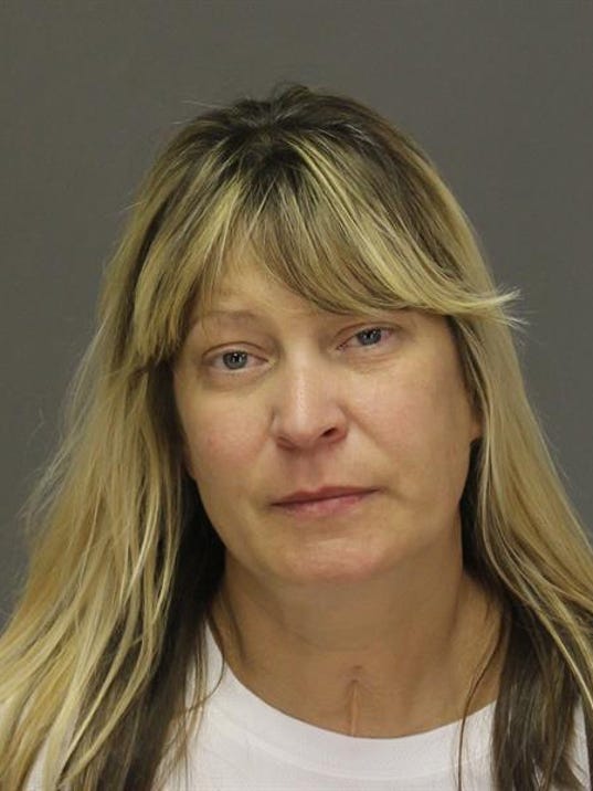 Westland woman charged with assaulting repo man