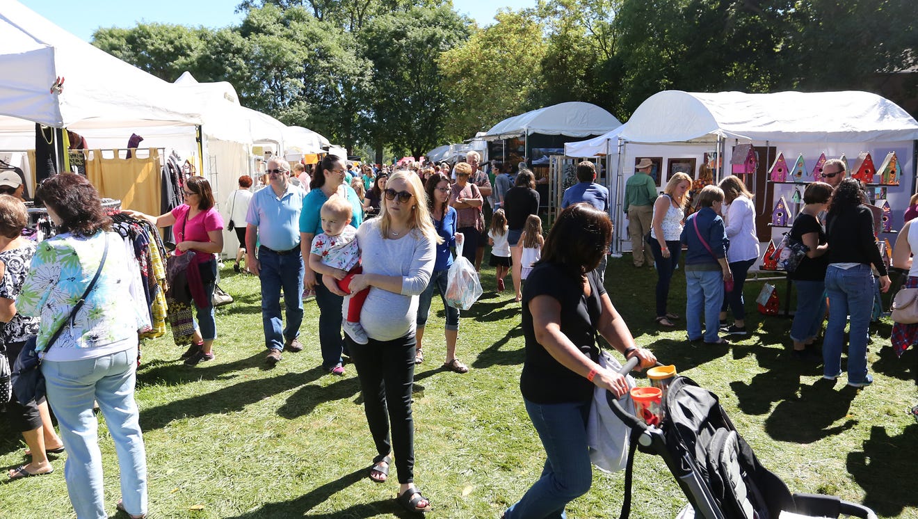 Crowds fill park for Art & Apples fest in Rochester