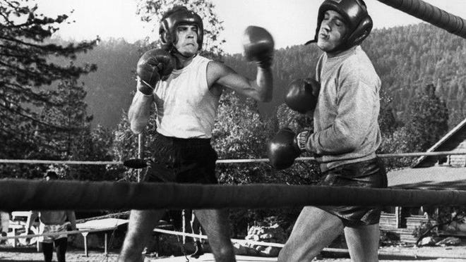 Critics pulled no punches over a punchier Elvis (right), sparring with Michael Dante in "Kid Galahad."