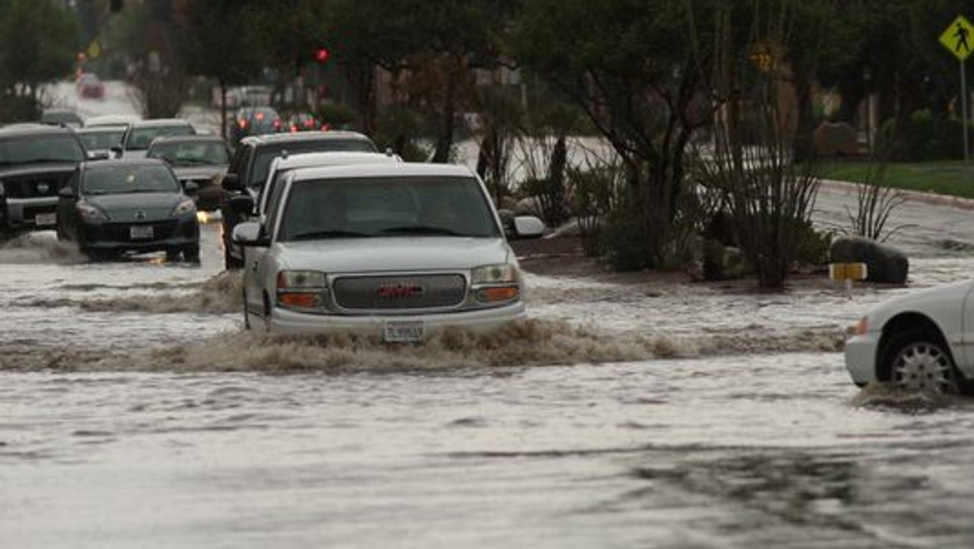 Flash floods, mud flows strand residents in California