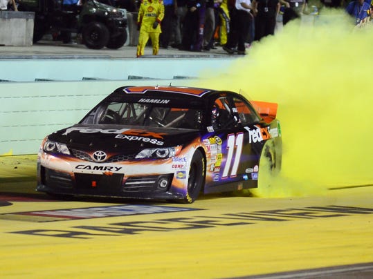 After tough year, Denny Hamlin finally finds victory lane