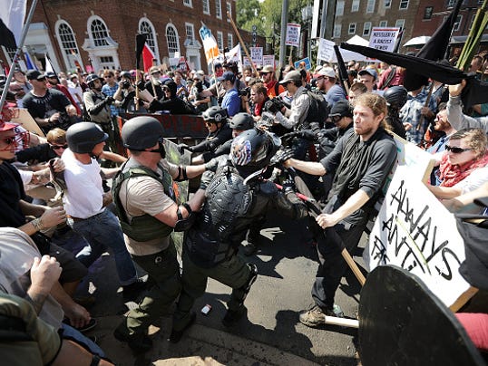 Violent Clashes Erupt at "Unite The Right" Rally In Charlottesville