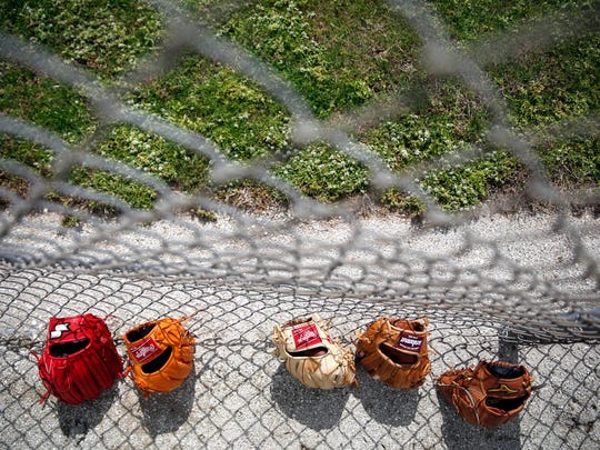   Baseball gloves imported from China appear on the list of imports President Donald Trump threatens customs duties. 