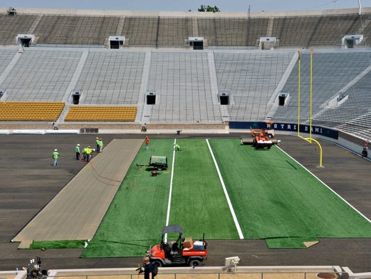 Local company used to install Notre Dame football field
