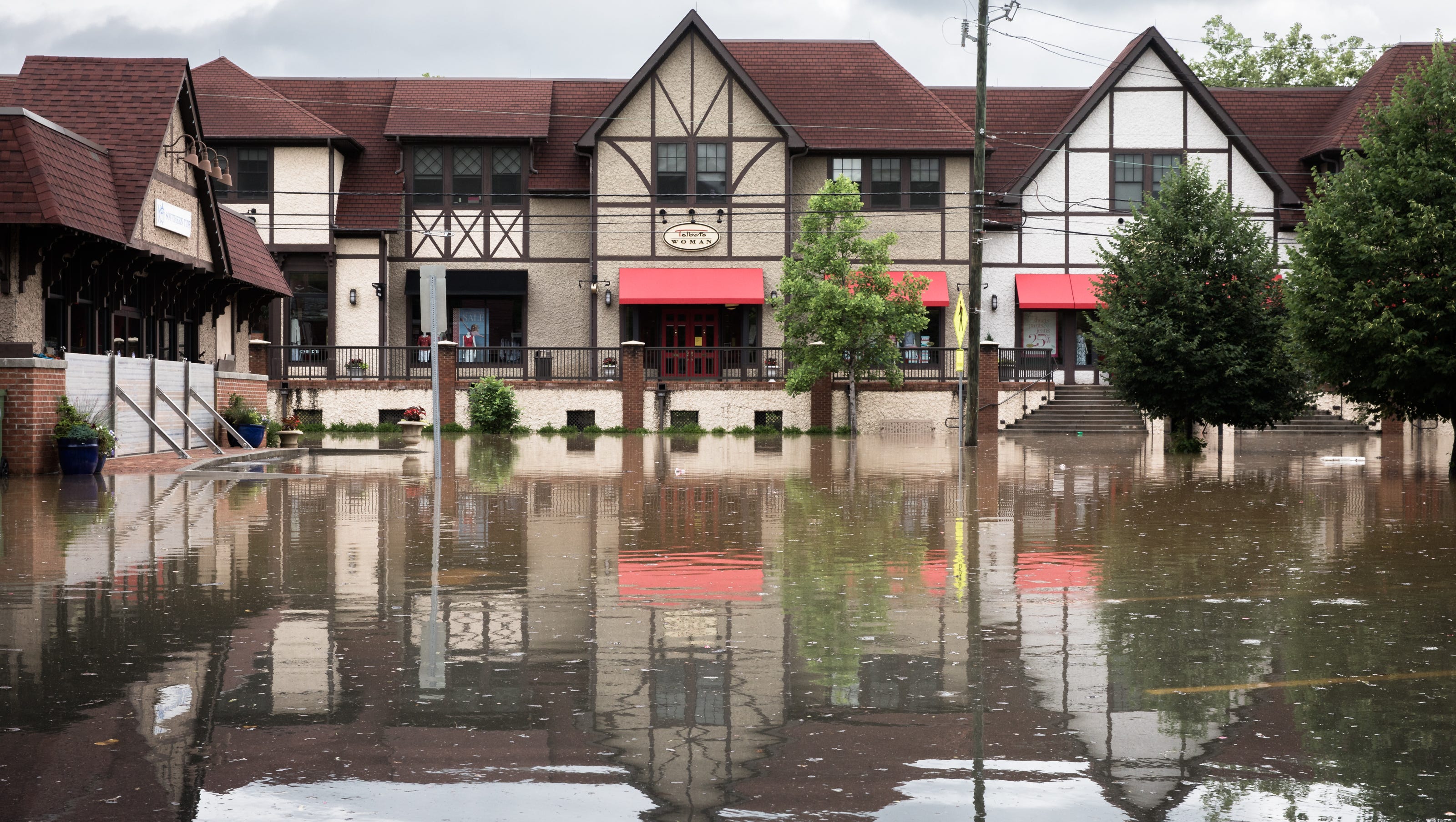 Asheville Floodwaters Send Biltmore Area Scrambling   636632787579414414 BiltmoreVillageFlooding MB3 05302018 