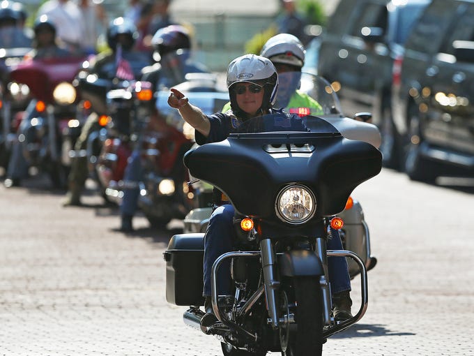Gov. Mike Pence leads motorcycle ride
