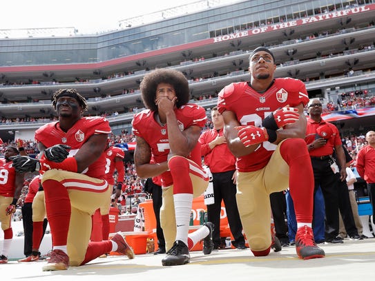 Eric Reid, right, was the 18th overall pick out of LSU in the 2013 draft.