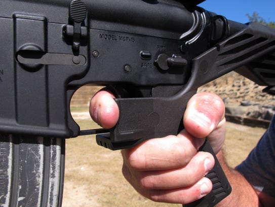 This AR-15 rifle is fitted with a "bump stock." The