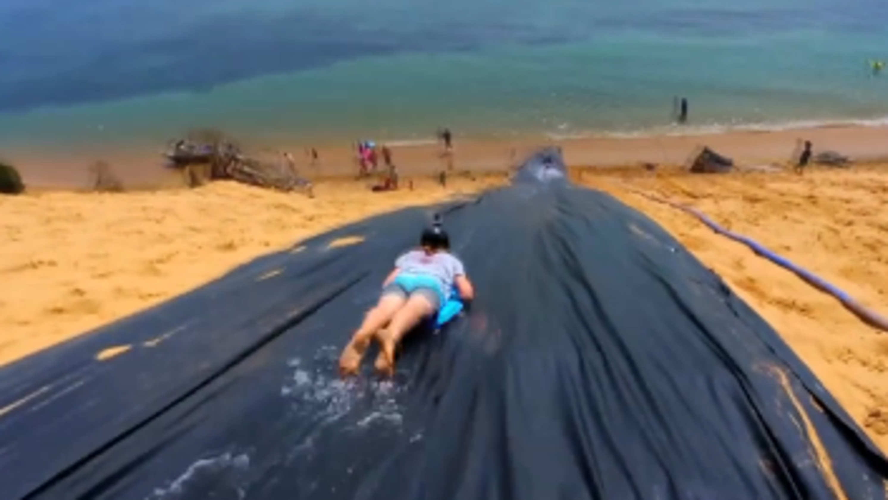 Watch Homemade Slipn Slide Launch Riders Into Air