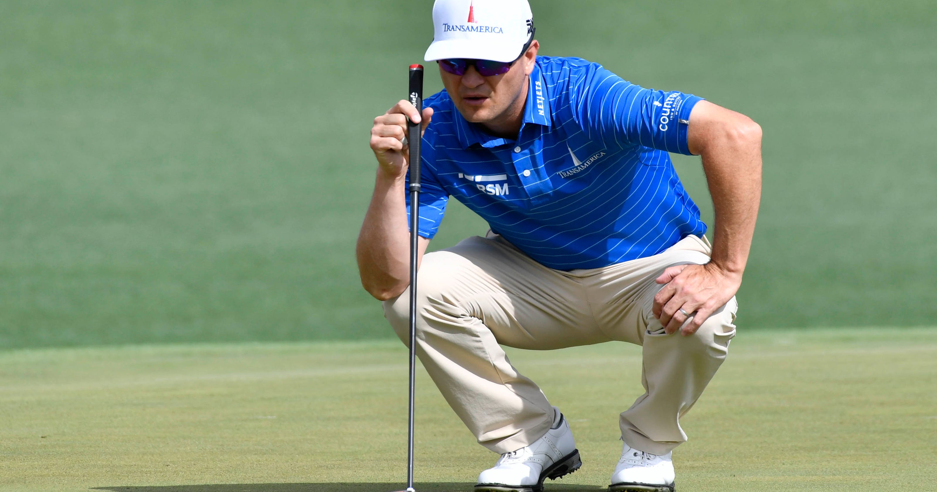 Masters Zach Johnson hits ball on practice swing