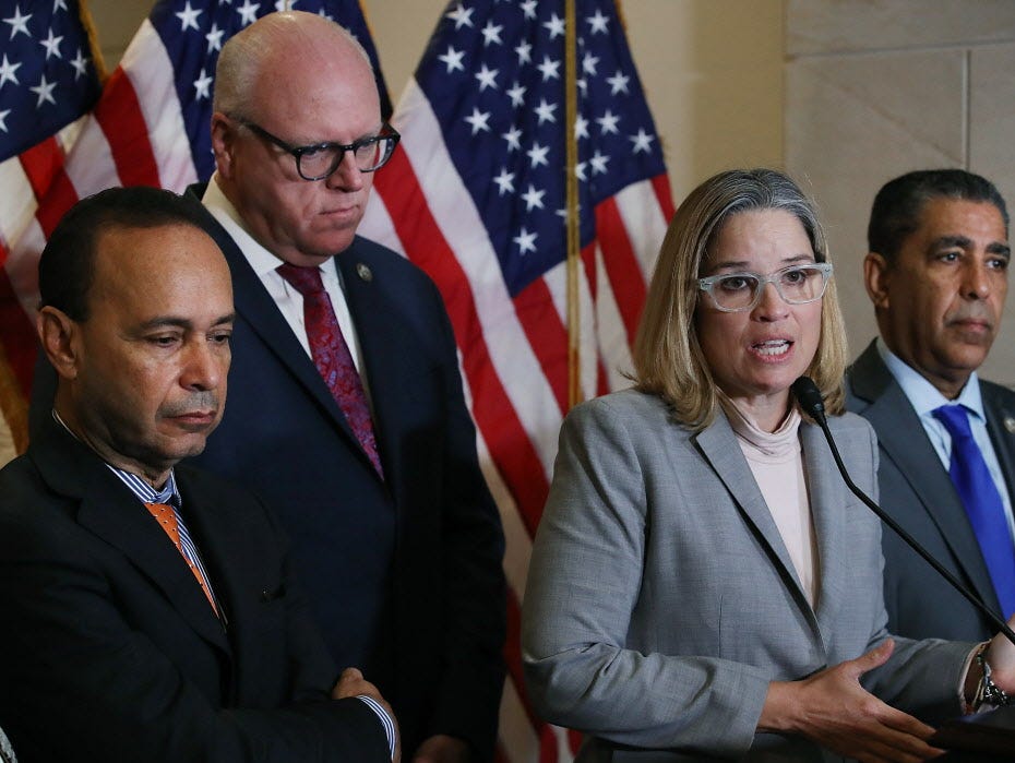 Carmen Yulin Cruz, Mayor of San Juan Puerto Rico, speaks to the media after meeting with the House Democratic Caucus about the current situation in Puerto Rico, on Capitol Hill November 1, 2017 in Washington, DC. Also pictured are (L-R), Rep. Luis Gu