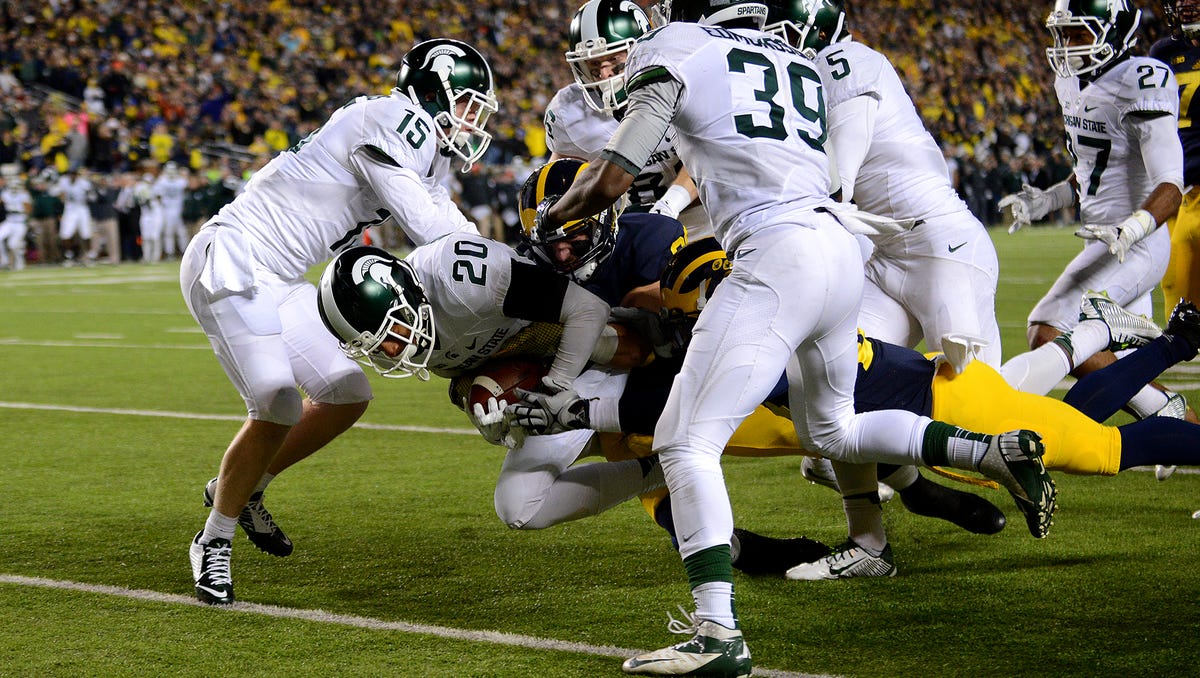 Photos Spartans Pull Off Stunning 27 23 Win Over Michigan 