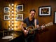 Charles Esten poses in his dressing room at the Grand