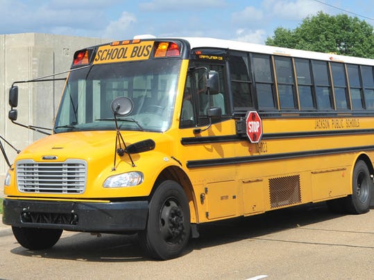 School bus runs over Jackson school district worker