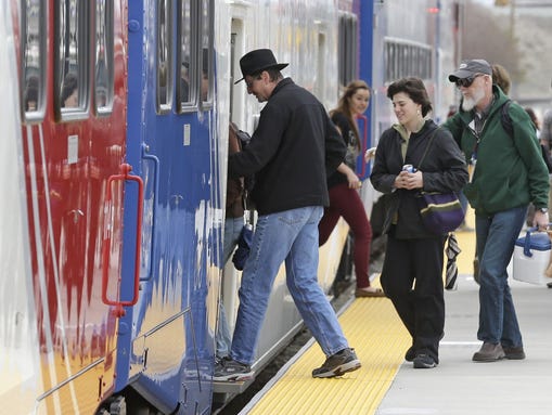 Commuters board the Frontrunner commuter rail line