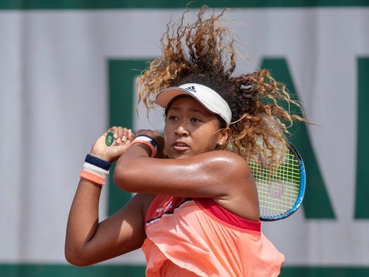 Naomi Osaka of Japan in action during her match against