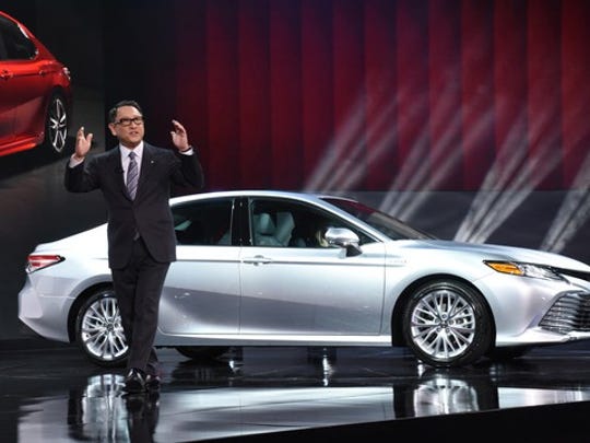 Toyota CEO Akio Toyoda speaks at the 2017 Detroit auto show.