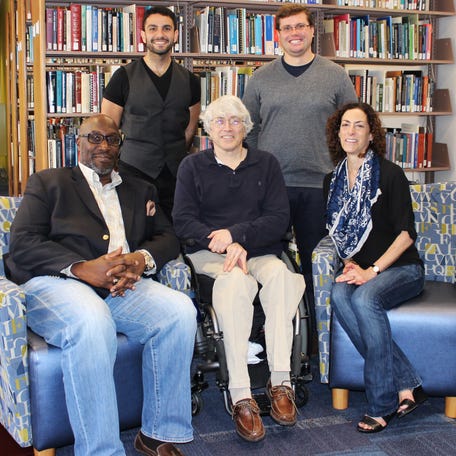Rutgers School of Management and Labor Relations research team members discovered that employers are less likely to interview qualified applicants who disclose disabilities. Pictured from left to right are professors Patrick McKay, Doug Kruse and Lisa Schur. Standing behind them are doctoral candidates Mason Ameri, left, and Scott Bentley.