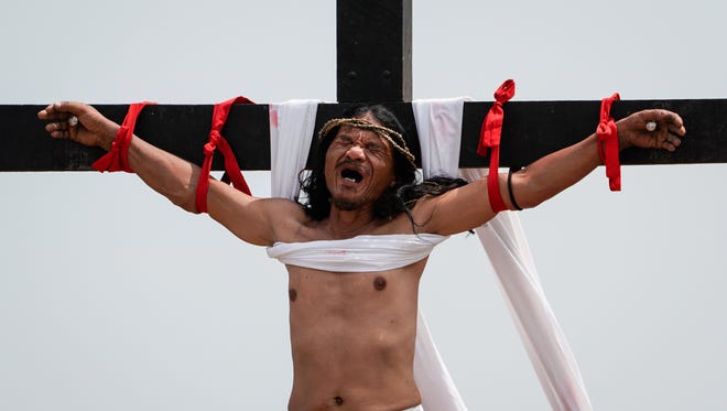 Sharp Nailed Japanese - Christians nailed to crosses on Good Friday in Philippines