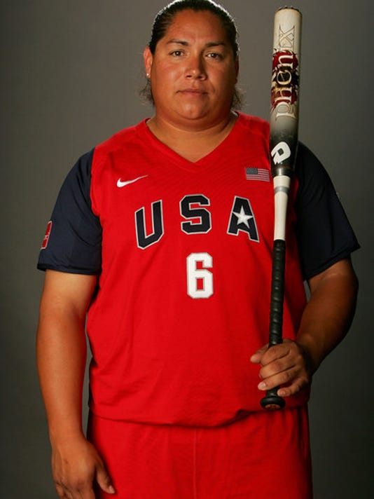 Crystl Bustos, the former designated hitter and third baseman for the U.S. ...