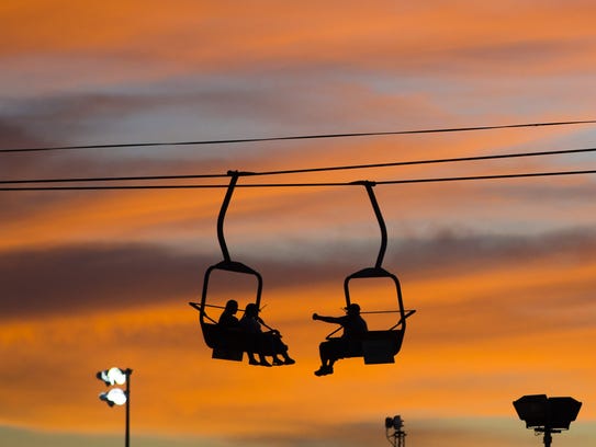 The sun sets on visitors on the Sky Ride at the Arizona