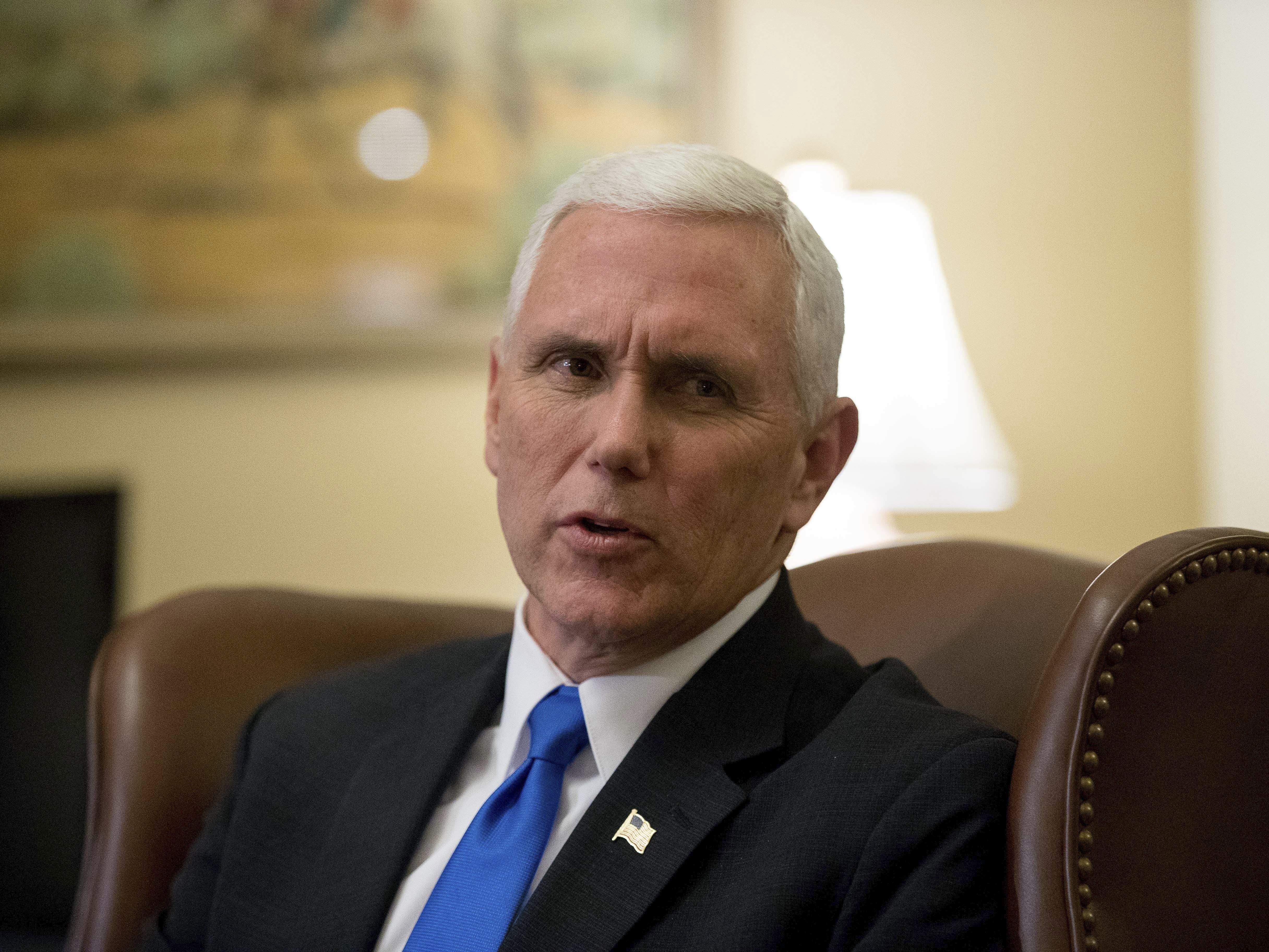 Vice President-elect Mike Pence speaks to members of the media while meeting with House Speaker Paul Ryan of Wis., on Capitol Hill in Washington, Wednesday, Nov. 30, 2016.