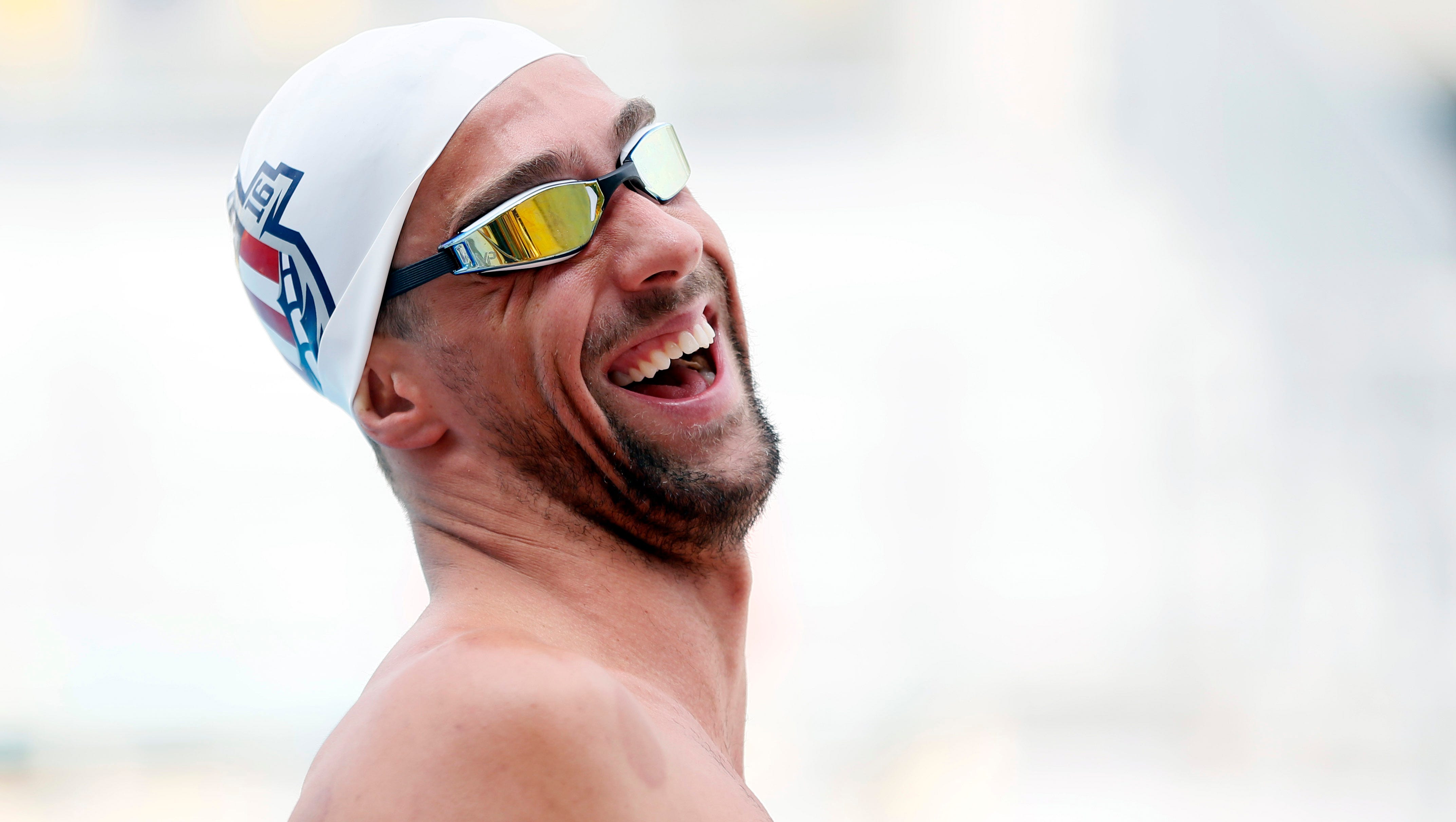 Michael Phelps says he feels like a 'different person now'