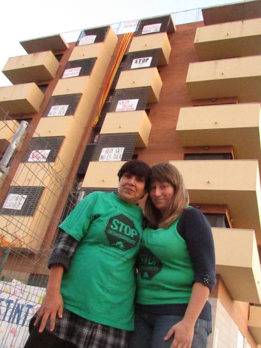 Spain squatters take over buildings after foreclosures