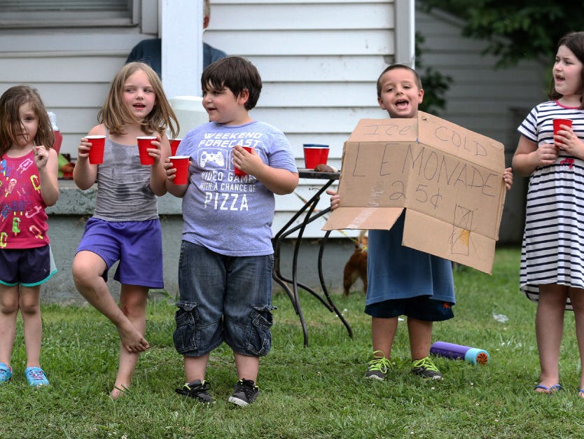 Children sell lemonade on July 19 in Owensboro, Ky.