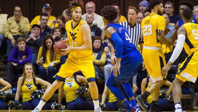 College basketball this week: West Virginia goes for sweep of Kansas