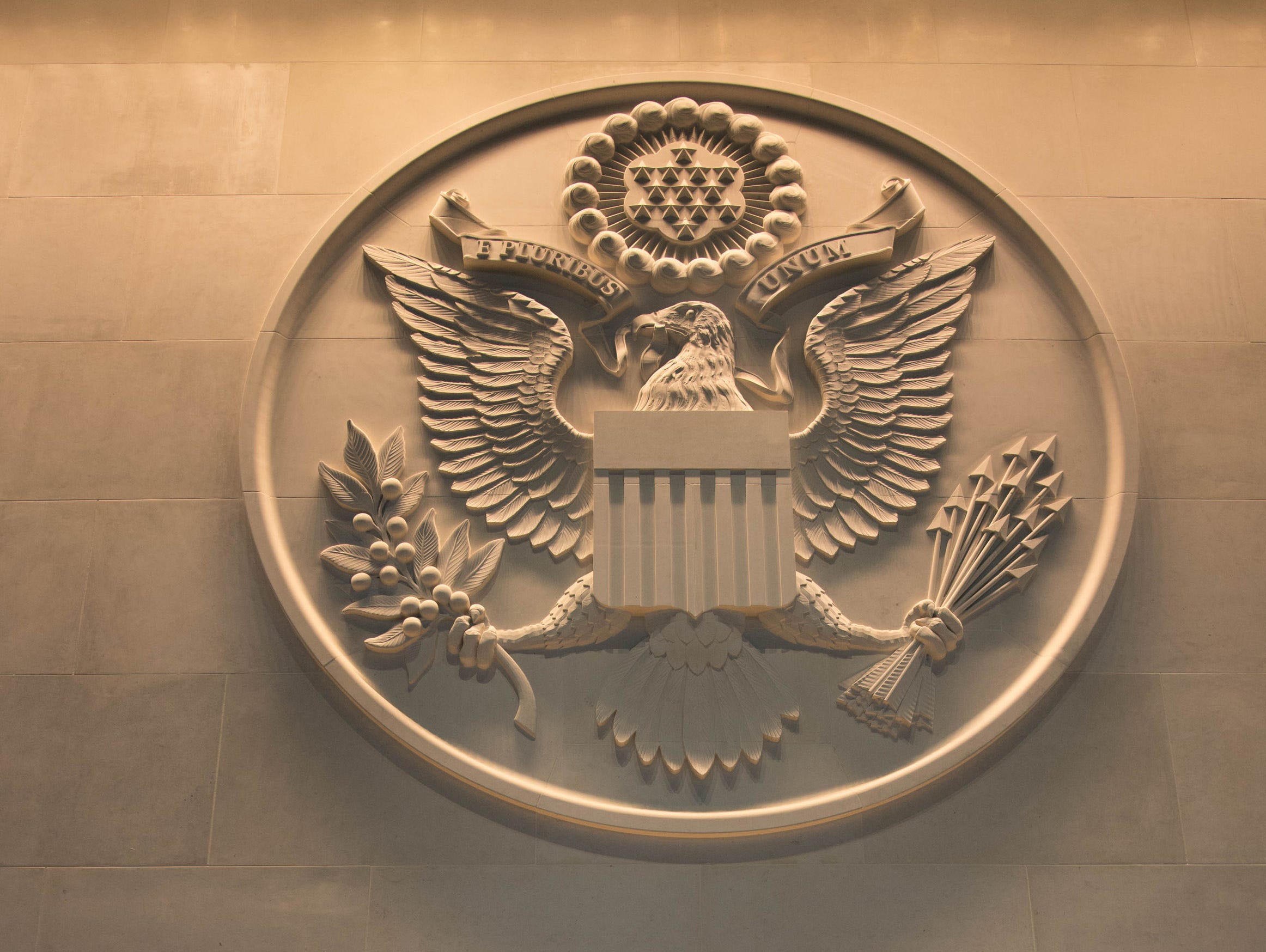 A large Department of State embossed seal.