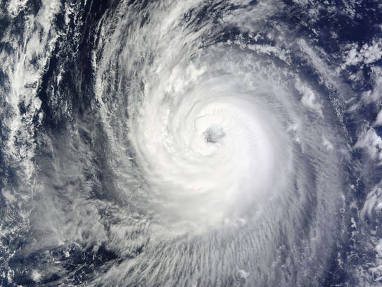 3 U.S. airmen swept away in deadly typhoon